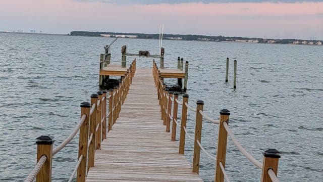 Renovated waterfront dock with new decking, completed by Stewart Bradley Pier Services