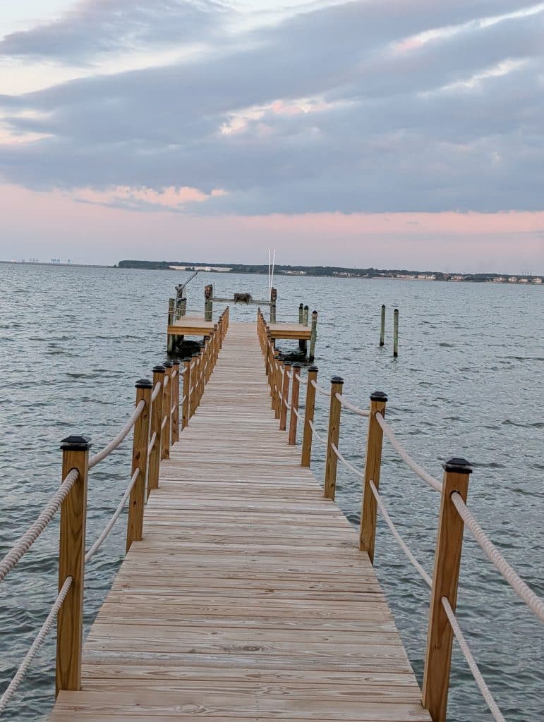 Renovated waterfront dock with new decking, completed by Stewart Bradley Pier Services